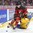 MONTREAL, CANADA - JANUARY 4: Sweden's Sebastian Ohlsson #25 trips Canada's Noah Juulsen #3 resulting in a tripping penalty in the first period during semifinal round action at the 2017 IIHF World Junior Championship. (Photo by Matt Zambonin/HHOF-IIHF Images)

